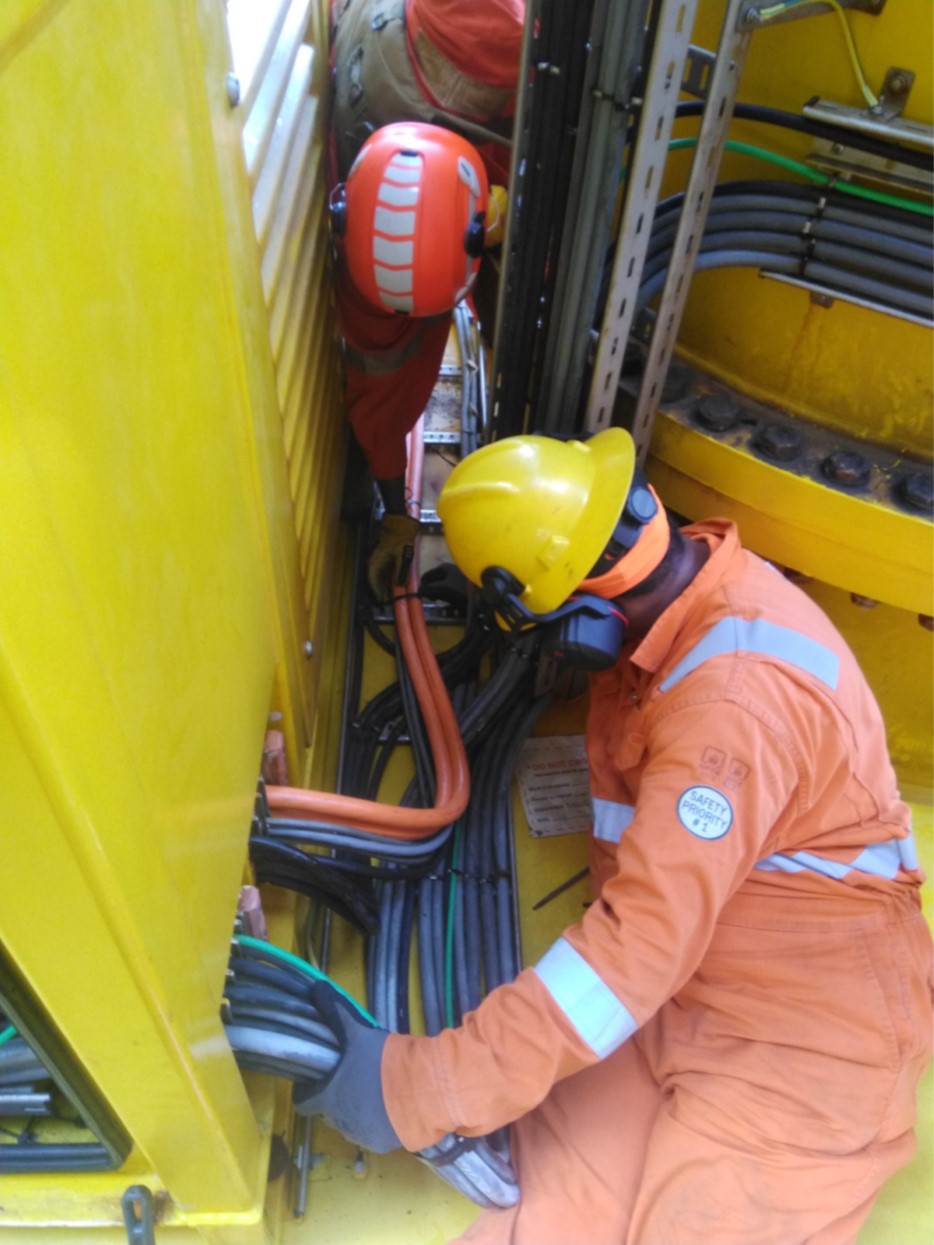 Cable installation on industrial cable trays